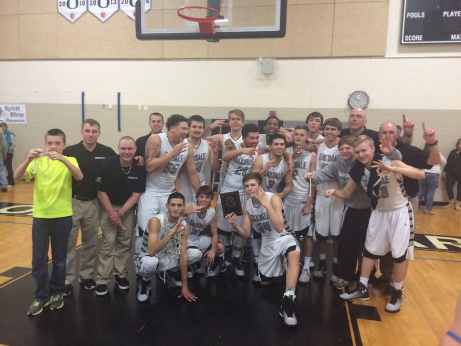 2015 Boys Basketball celebrate their third consecutive regional title in a home win over Century.