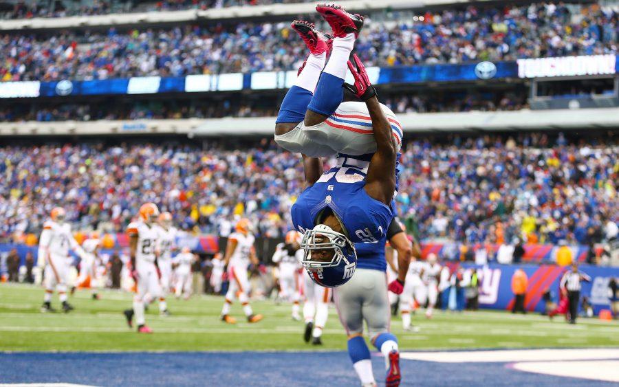 EAST RUTHERFORD, NJ - OCTOBER 07:  David Wilson #22 of the New York Giants celebrates his touchdown against the Cleveland Browns by doing a backflip during their game at MetLife Stadium on October 7, 2012 in East Rutherford, New Jersey.  (Photo by Al Bello/Getty Images)