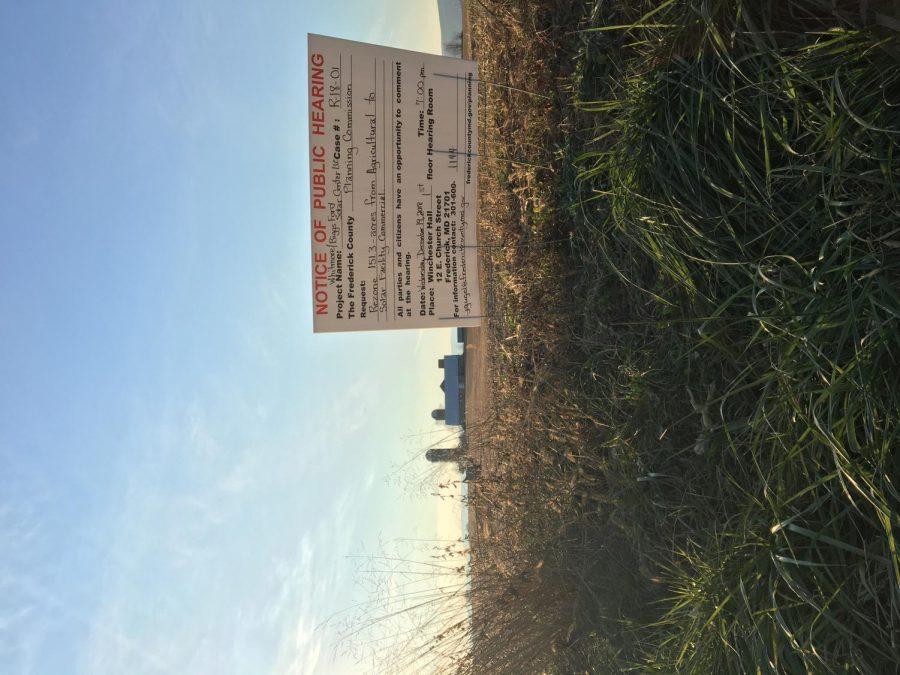 This is the site of the proposed solar array and the notice of a public hearing to discuss rezoning the land from agricultural to a solar facility.                