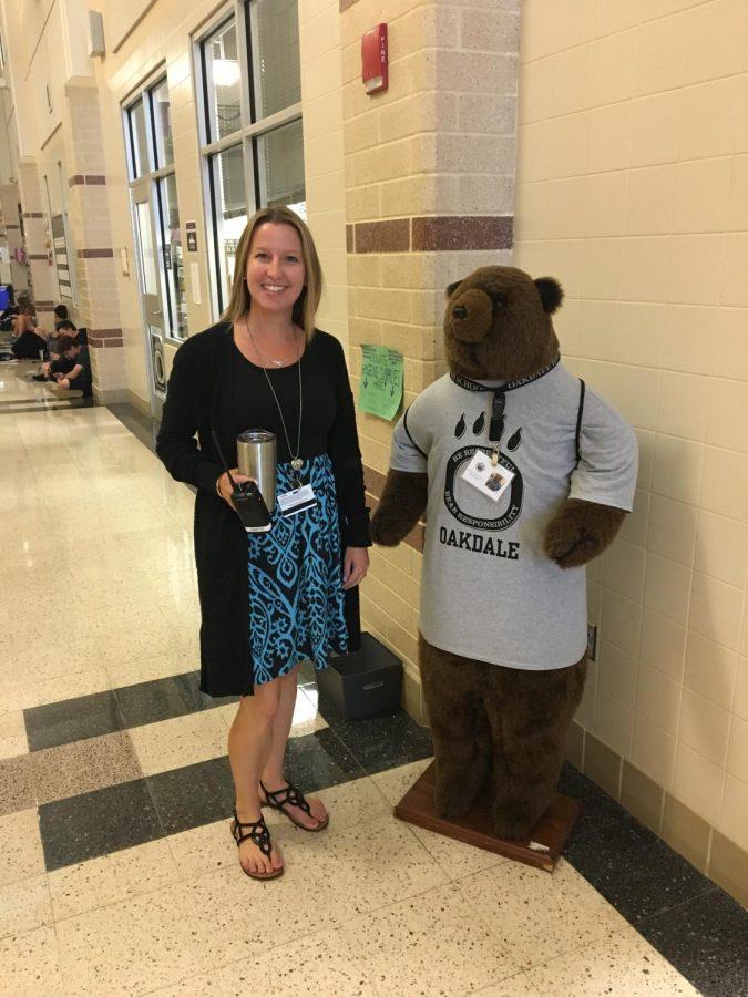 Excited to be a bear, Ms. Smith poses with her new friend Harvey.