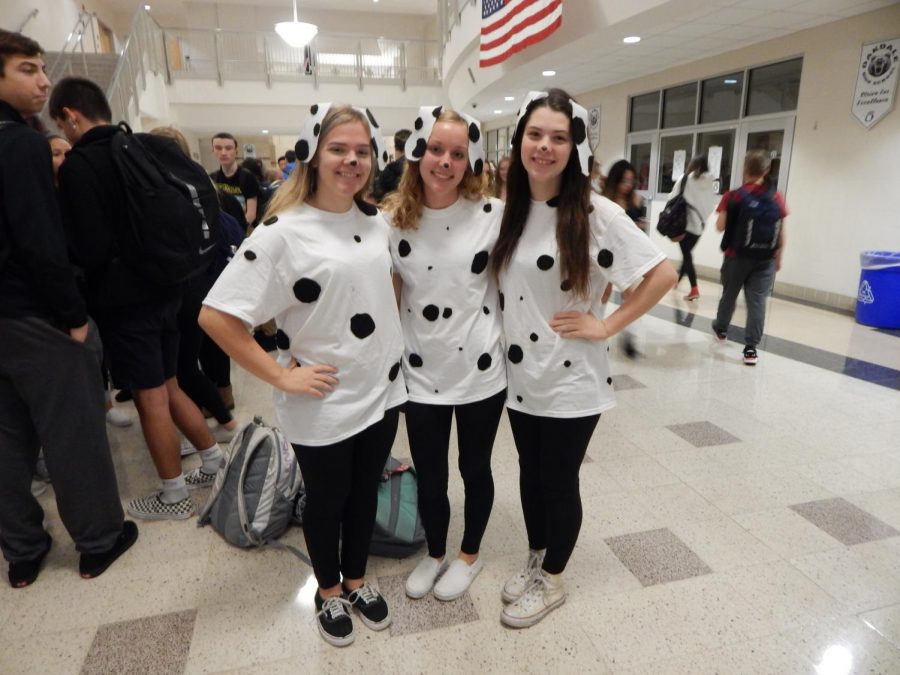Julia Case, Rebecca Long, and Anna Plank did a group dalmation costume to be festive for the holiday. They all wore white spotted shirts, black leggings, and fabric to resemble dog ears to complete the look.