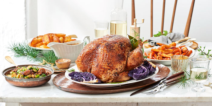 A typical American Christmas dinner looks like it could be spiced up with some diverse foods.