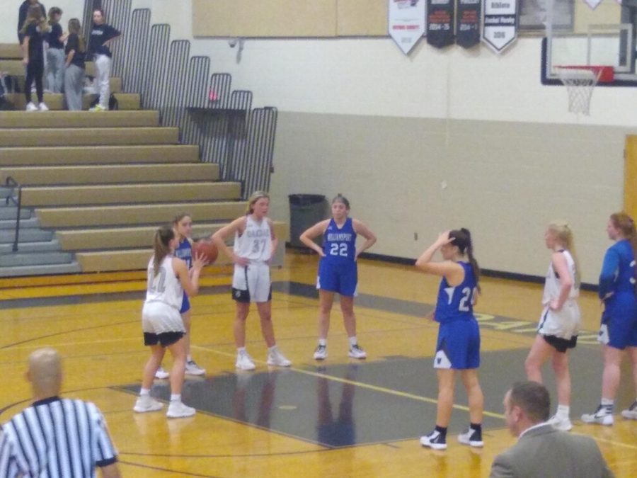 Point guard Nikki Etchison takes two free throws in the fourth quarter to save the game.

