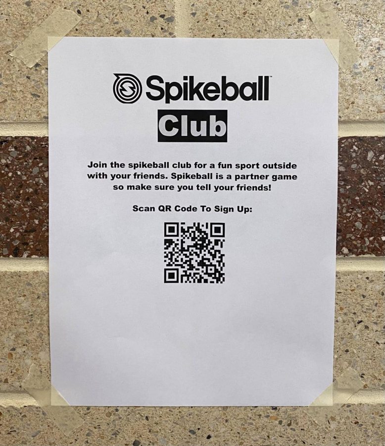 The Spikeball Club flier hung up in an Oakdale High School hallway.
