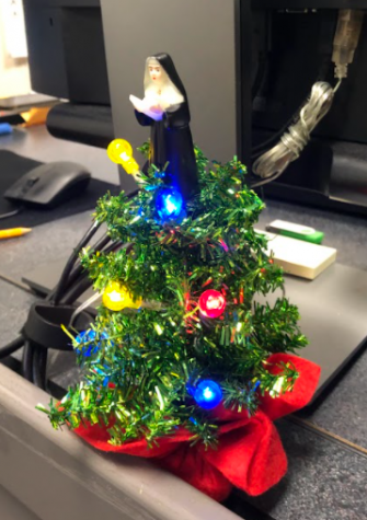Mr. Trigger, a computer science teacher here at Oakdale, loves the holidays. In fact, he keeps the small Christmas tree shown above lit and on his desk all year round.
