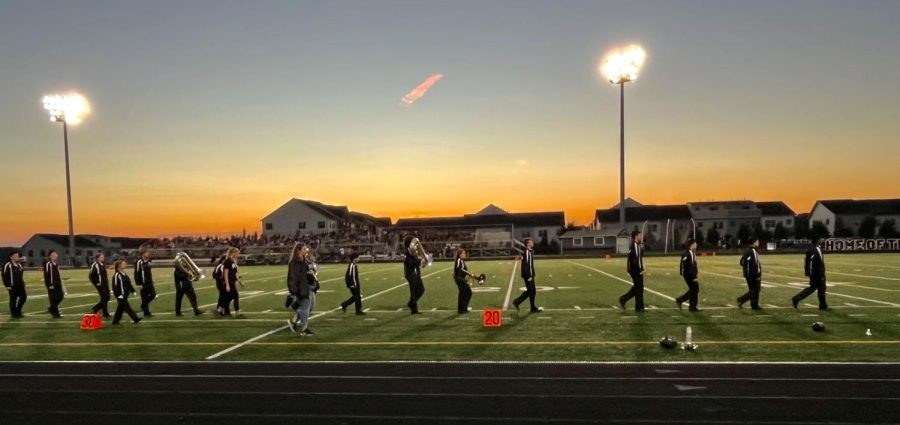 Ms. Burton walking her Marching Bear Band off the field after their inaugural performance at Friday night’s Football game.