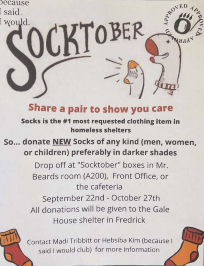 One of the Socktober posters, posted in Main Street to help combat homelessness in Frederick. 