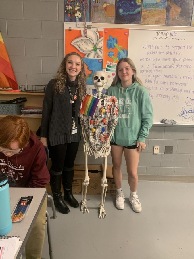 Mrs. George and Jocelynn Todd pose with Benny the skeleton!