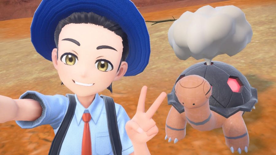 A Pokemon trainer taking a selfie next to their Torkoal, the coal Pokemon.