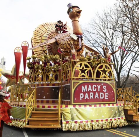 Tom the Turkey, a traditional float in the Macys Thanksgiving Day parade, graces the streets of New York City.