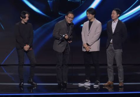 Hidetaka Miyazaki gives his acceptance speech onstage alongside Elden Ring team members.