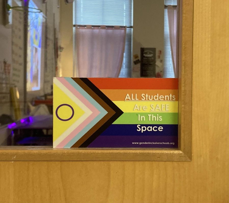 A picture of the pride flag sticker outside of Madame Quill’s room.
