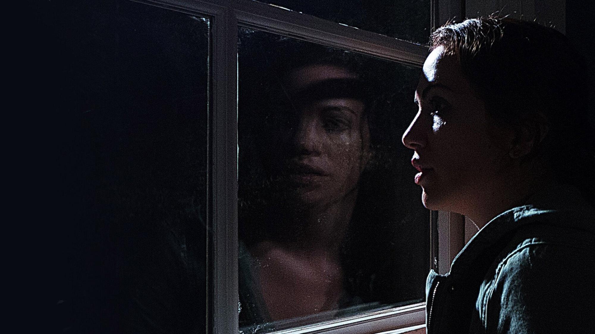 Actress Kate Siegel as deaf writer Maddie, seen in a still from Mike Flannagan’s 2016 film, Hush.