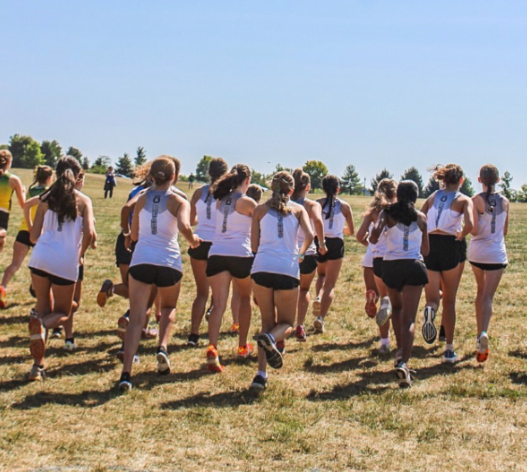 Oakdale girls cross country runs at Utica Park for the Hood College Invitational