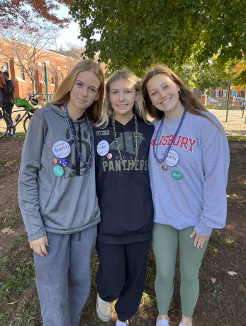 Karalyne Merrell, Jordyn Turner, and Emma Dees walk the Out of the Darkness event to show support for suicide at Bakers Park.
