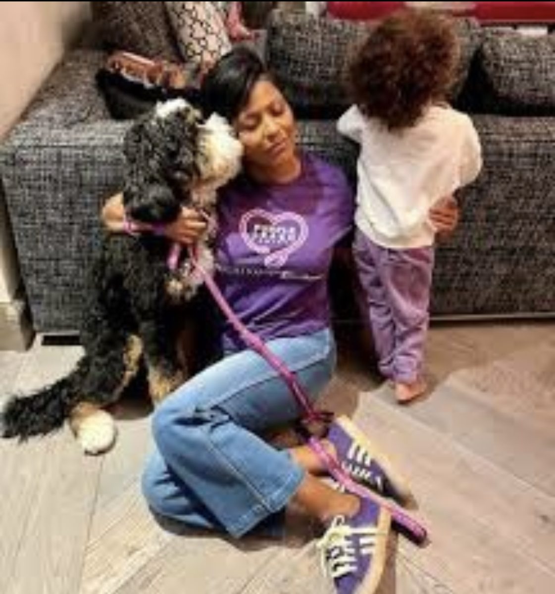 Tamron+Hall+and+her+kid+showed+their+support+by+wearing+purple.+