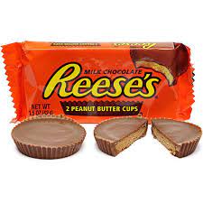 The Reese’s Peanut Butter Cups show the well-known chocolate cup shape and the peanut butter inside.