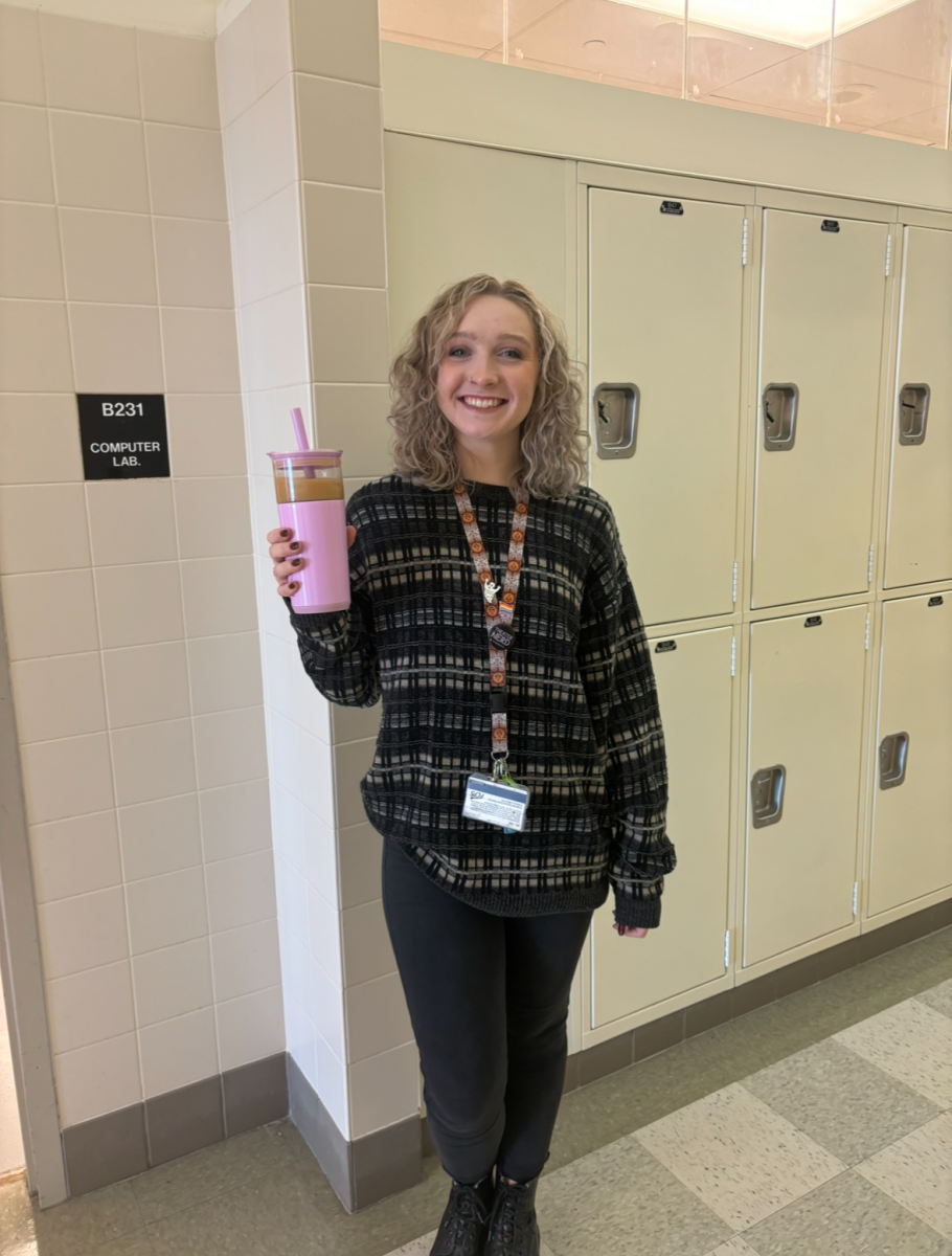 Art teacher Maggie George with her iced coffee during her 1st block planning time. 