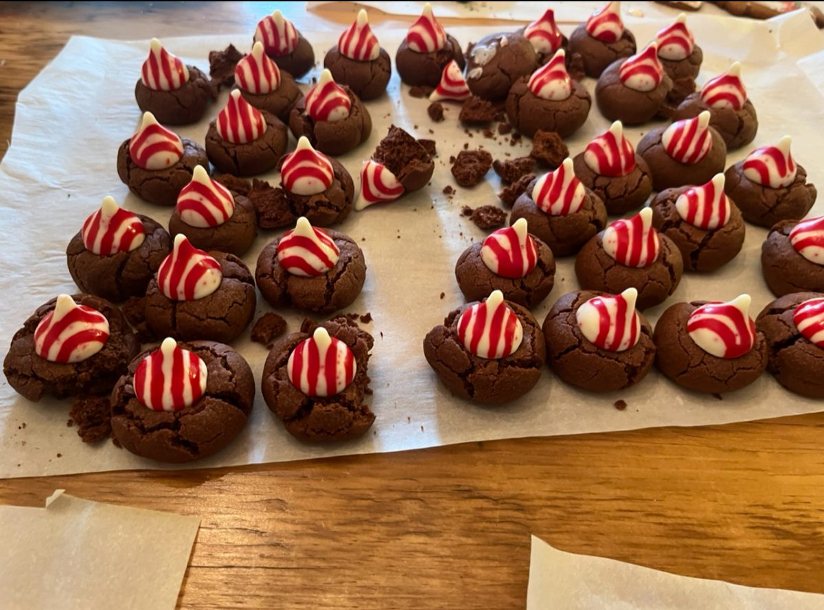 Alexia Isacco baked cookies with a peppermint Hershey Kiss on top to give a start to Christmas celebrations.