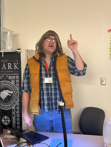 Mr. Hartwig teaches while wearing his favorite wig.