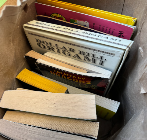  A bag of books placed in the book drive donation box in the front vestibule.