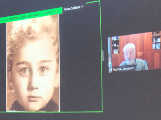 Andrew Jampoler talks about his childhood while a picture of him as a boy is on display