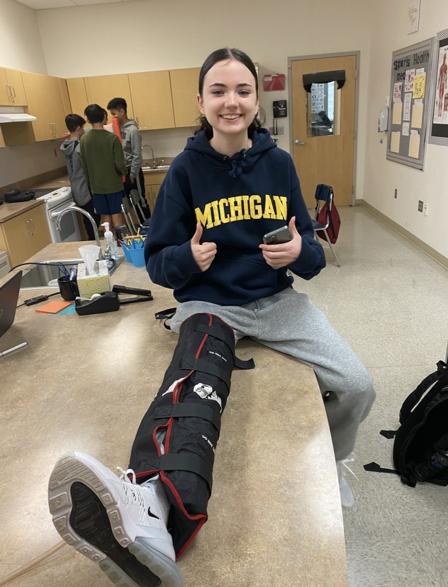 Senior Kaelin Bailey practices working with a vacuum splint for sports related injuries. 