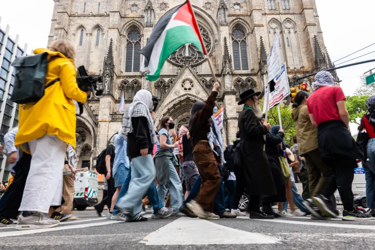 Pro-Palestinian demonstrators at Columbia University march to Hunter College.